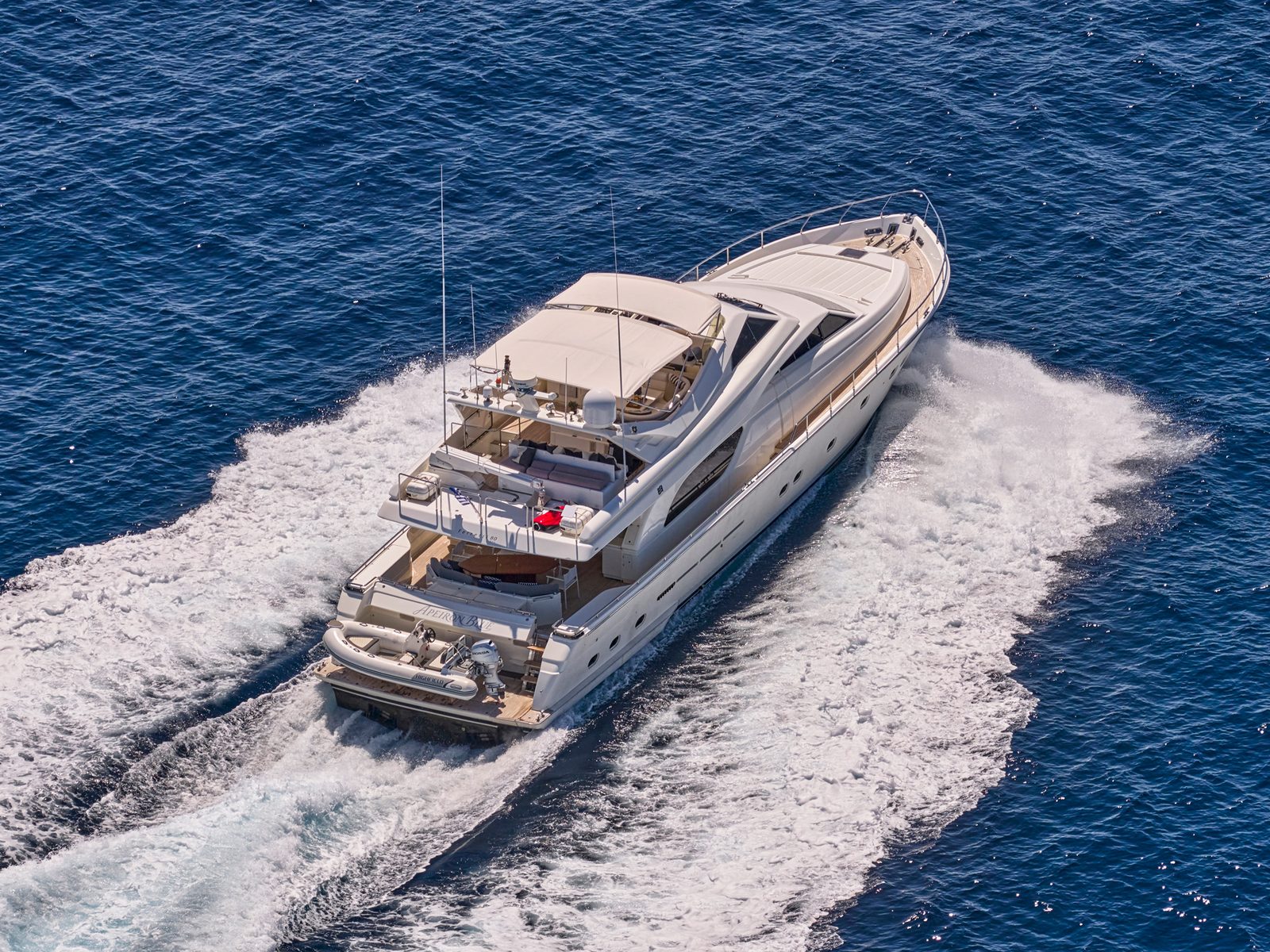 Apeiron Blue, an 80-foot Ferretti, cruising the Aegean